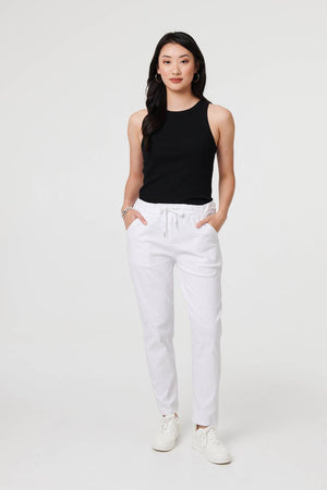 White | Drawstring Tie Waist Tapered Trousers : Model is 5'9