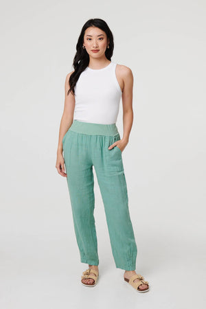 Sage | Relaxed Linen Blend Tapered Trousers : Model is 5'9