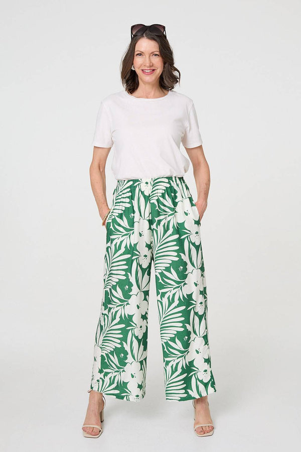Green | Tropical Floral Wide Leg Trousers : Model is 5'8"/172 cm and wears UK10/EU38/US6/AUS10