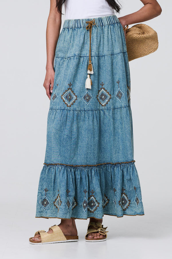 Indigo | Embroidered Tiered Tassel Waist Maxi Skirt
