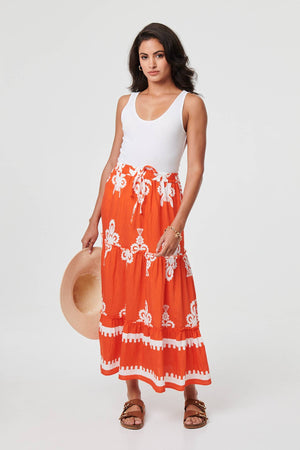 Orange | Ikat Print Tiered High Waist Midi Skirt : Model is 5'8