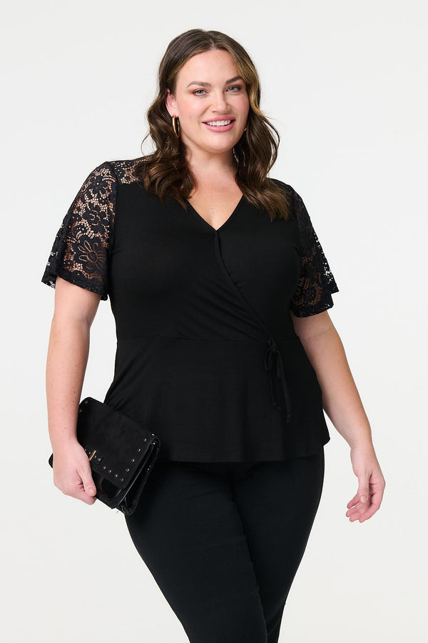 Black | Lace Sleeve V-Neck Peplum Top : Model is 5'8"/172 cm and wears UK18/EU46/US14/AUS18