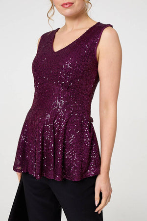 Purple | Sparkly Sequin Sleeveless Peplum Top : Model is 5'9