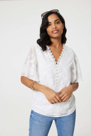 White | Floral Lace Detail Flared Sleeve Blouse : Model is 5'7