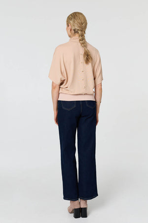 Beige | Roll Neck Button Back Relaxed Knit Top