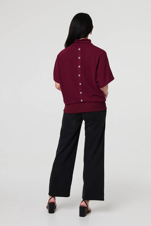 Red | Roll Neck Button Back Relaxed Knit Top
