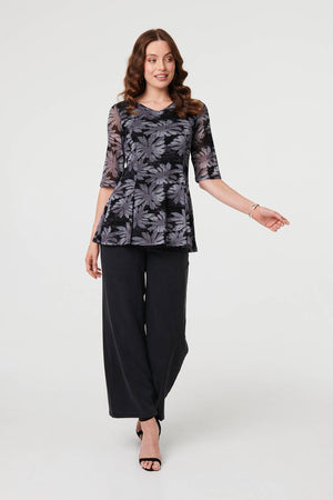 Black | Floral Relaxed Semi Sheer Peplum Blouse
