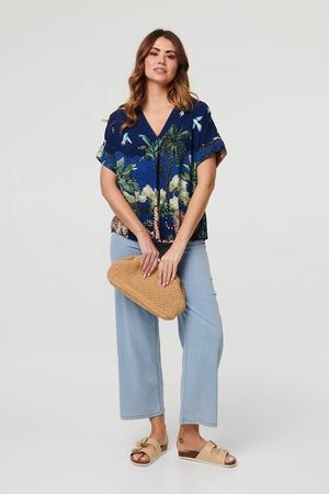 Navy | Tropical Print Short Sleeve Relaxed Top : Model is 5'9