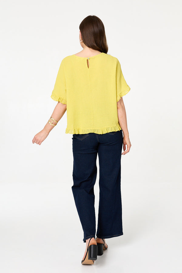 Yellow | Frill Hem 1/2 Sleeve Relaxed Top