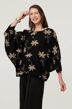 Black | Floral Embroidered 3/4 Sleeve Top : Model is 5'8