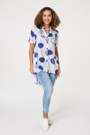 Navy | Polka Dot Drop Hem Blouse