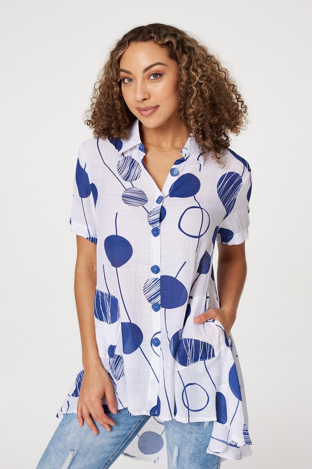 Navy | Polka Dot Drop Hem Blouse
