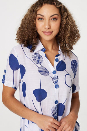 Navy | Polka Dot Drop Hem Blouse