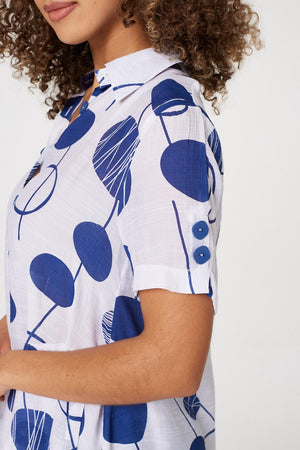 Navy | Polka Dot Drop Hem Blouse
