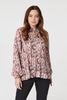 Pink | Printed Tie Neck Blouse : Model is 5'9
