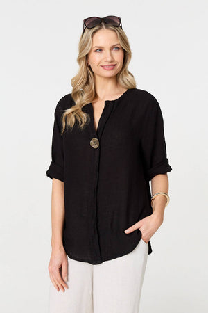 Black | Button Detail 1/2 Sleeve V-Neck Blouse : Model is 5'10