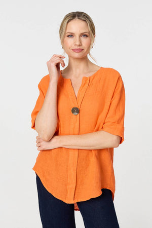 Orange | Button Detail 1/2 Sleeve V-Neck Blouse : Model is 5'10