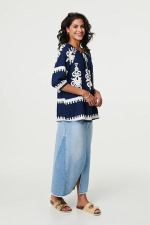 Navy | Ikat Print Tassel Tie Neck Blouse
