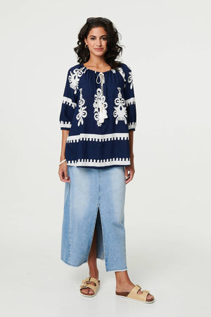 Navy | Ikat Print Tassel Tie Neck Blouse
