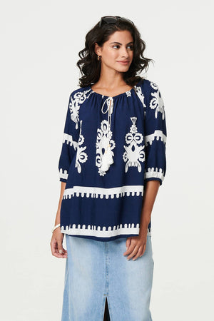 Navy | Ikat Print Tassel Tie Neck Blouse
