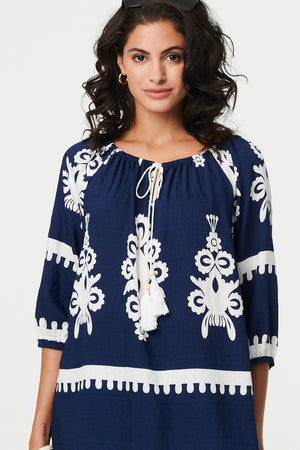 Navy | Ikat Print Tassel Tie Neck Blouse
