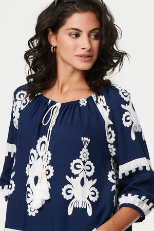 Navy | Ikat Print Tassel Tie Neck Blouse
