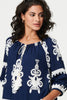 Navy | Ikat Print Tassel Tie Neck Blouse
