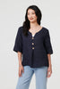 Navy | Button Detail 3/4 Sleeve Relaxed Blouse : Model is 5'9
