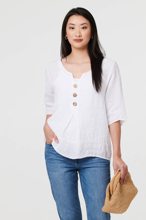 White | Button Detail 3/4 Sleeve Relaxed Blouse : Model is 5'9