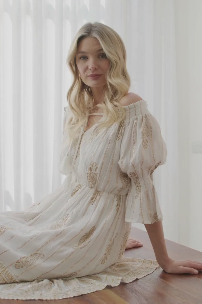 Cream | Ikat Print Knee Length Bardot Dress : Model is 5'9"/175 cm and wears UK8/EU36/US4/AUS8
