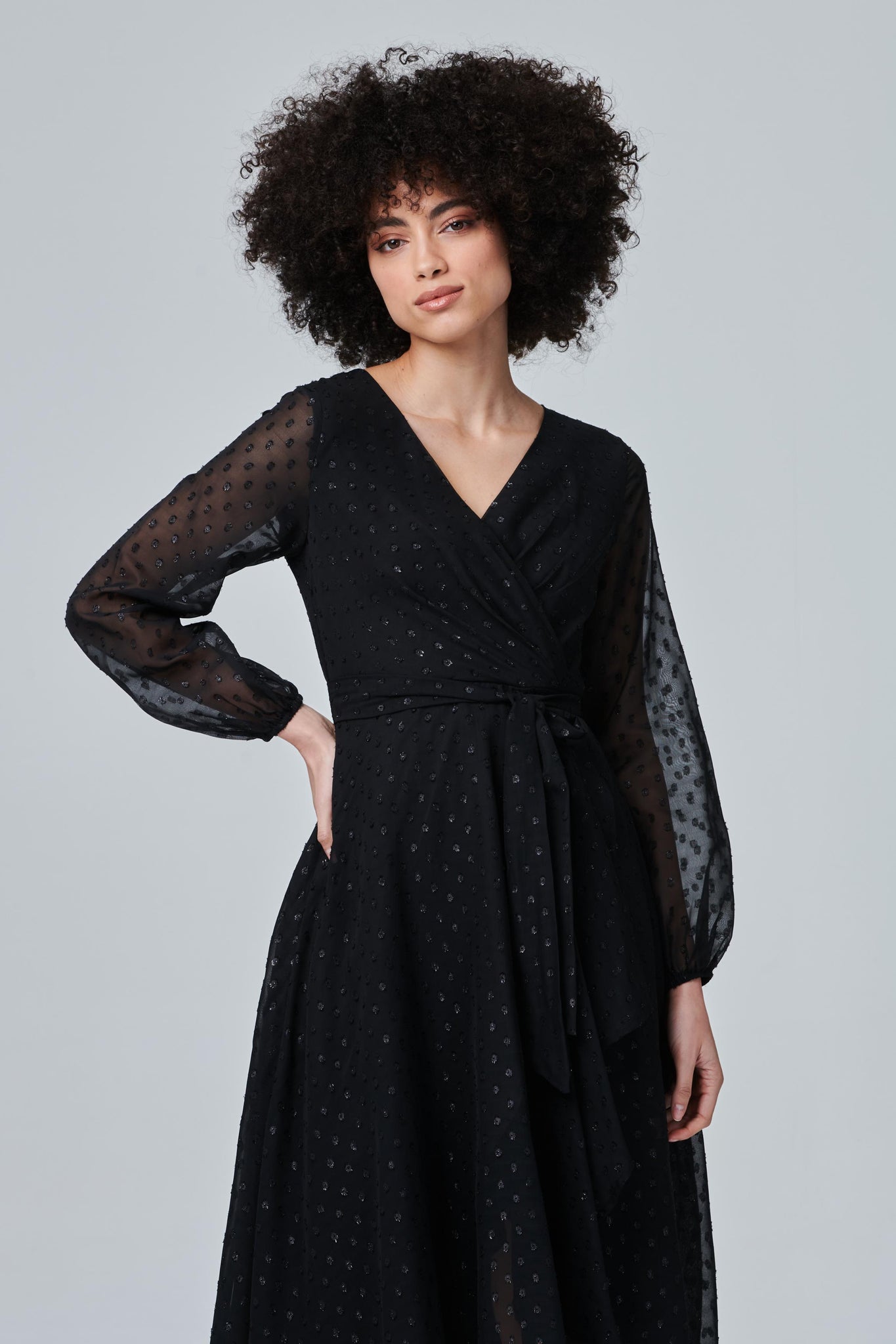 Black dress with sheer polka dot sleeve top